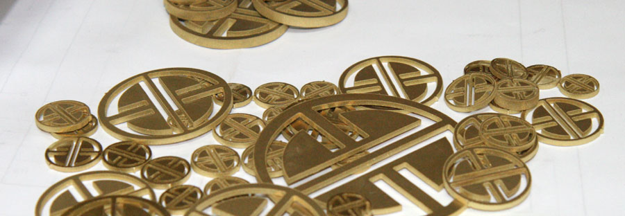 Brass symbols profile cutting in Perth